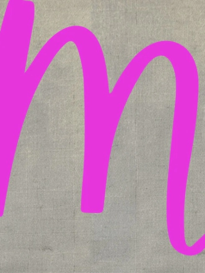 Hand Painted Alphabet Initials Linen Table Napkins, an initial napkin lying on a plain surface. 