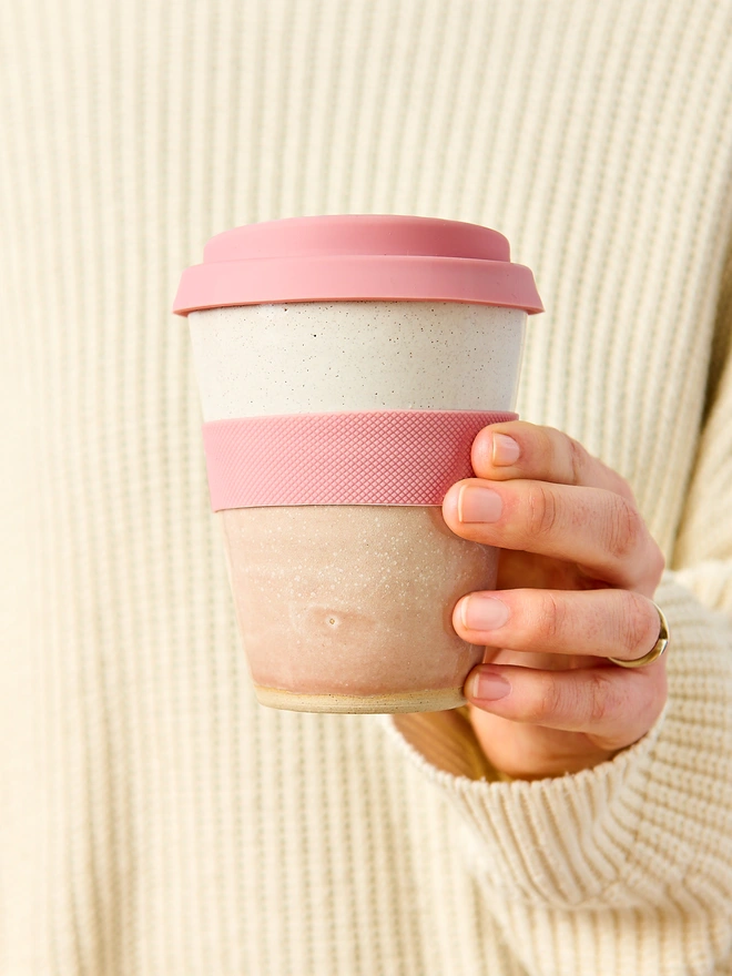 pink ceramic travel mug