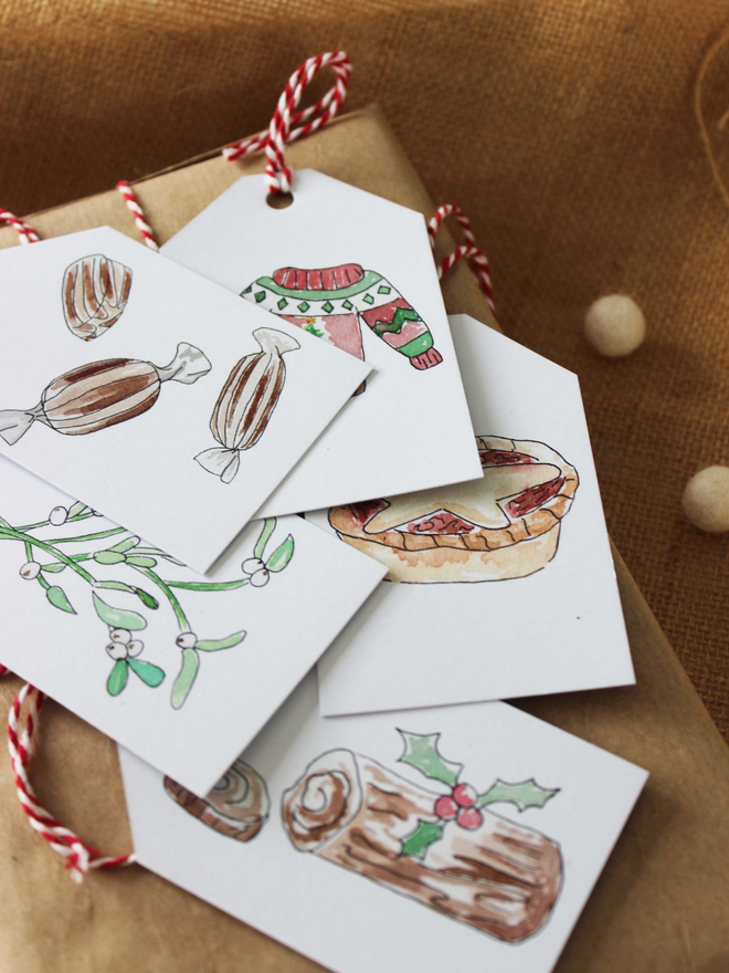 Designs of ‘An Eco-Friendly Christmas' Gift Tag 5 Pack being displayed on present