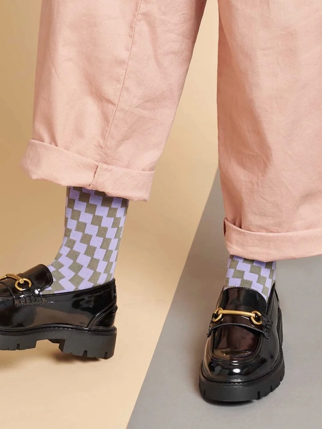 Women's Check Organic Cotten Ankle Socks, a woman wearing a pair of colourful patterned socks. 