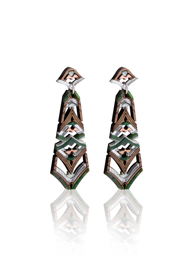 Laser cut earrings on white background.