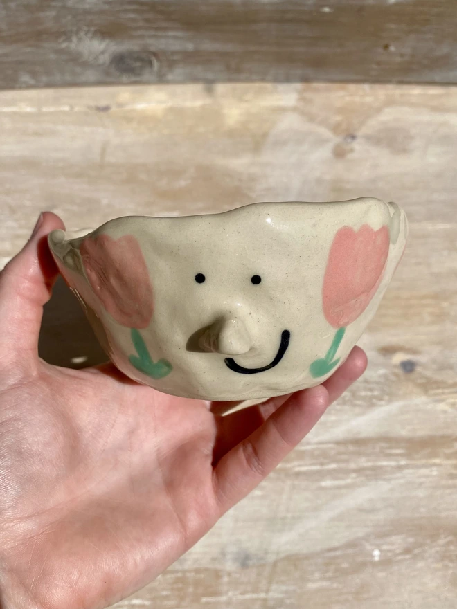 tulip ceramic pot - held