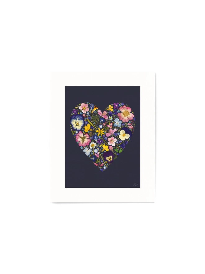 10x8” Floral Print of Pressed Flowers arranged in a heart shape, on an Ink background.