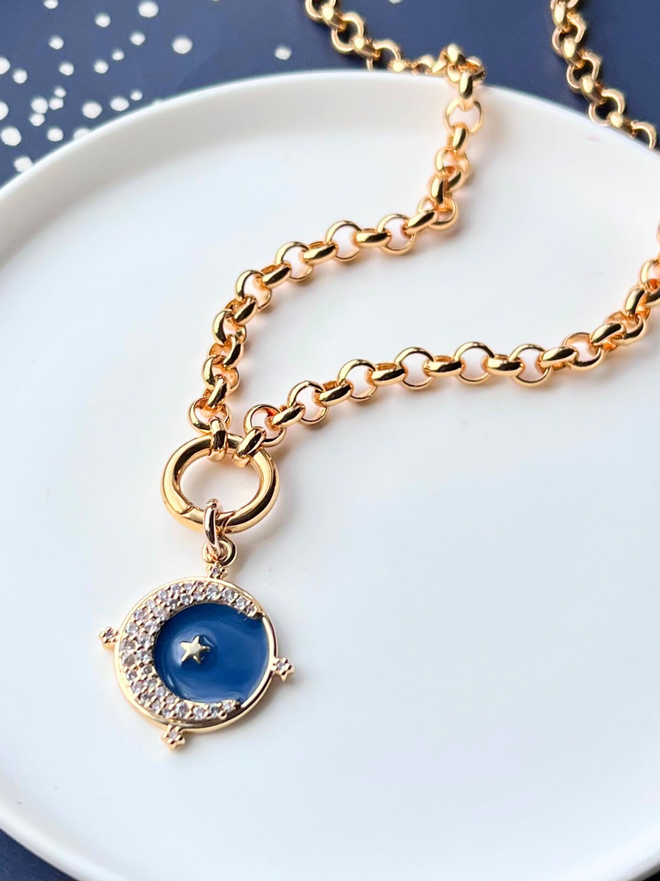 Navy enamel moon and star charm on gold belcher chain necklace