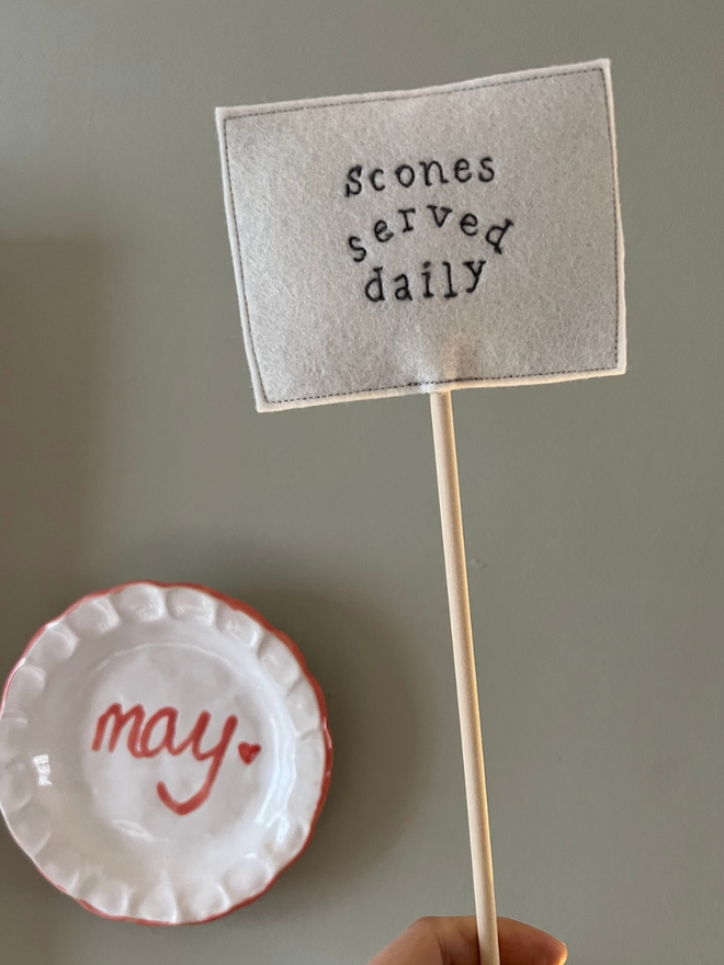 Scones served daily embroidered felt sign