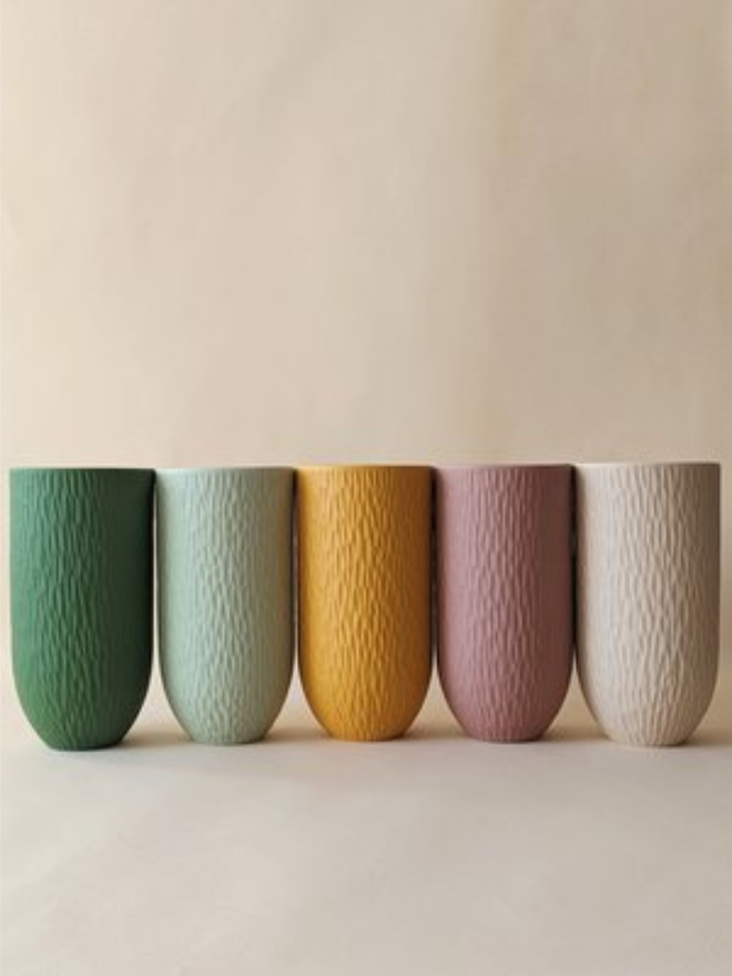 assorted colour handmade textured vases