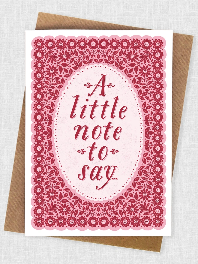 pink floral notecard with a little note to say hand lettered with brown kraft envelope