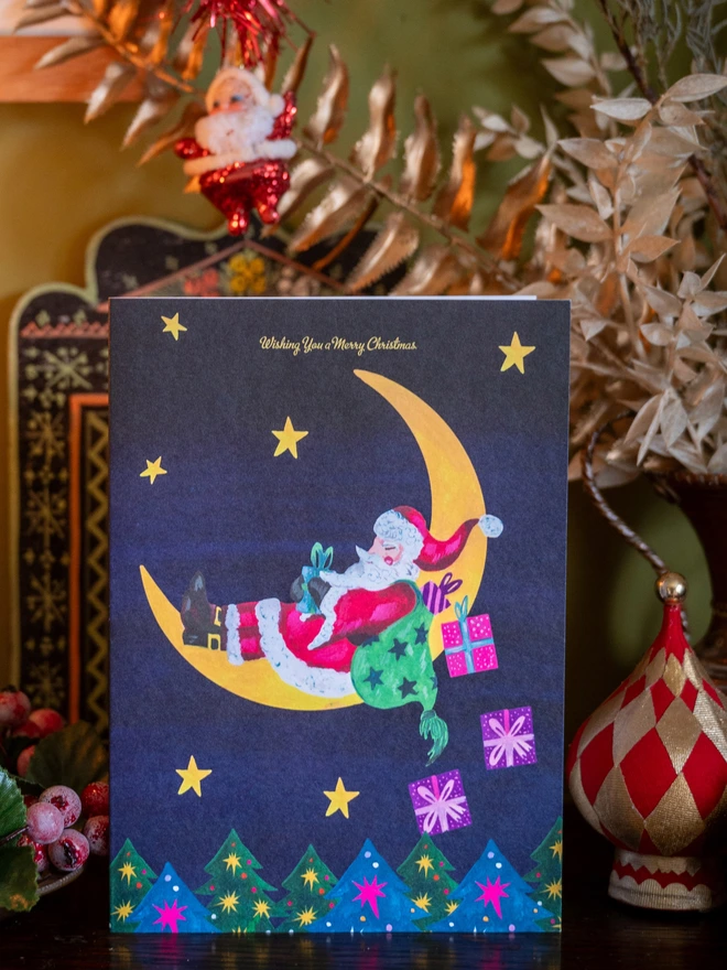 santa xmas card moon
