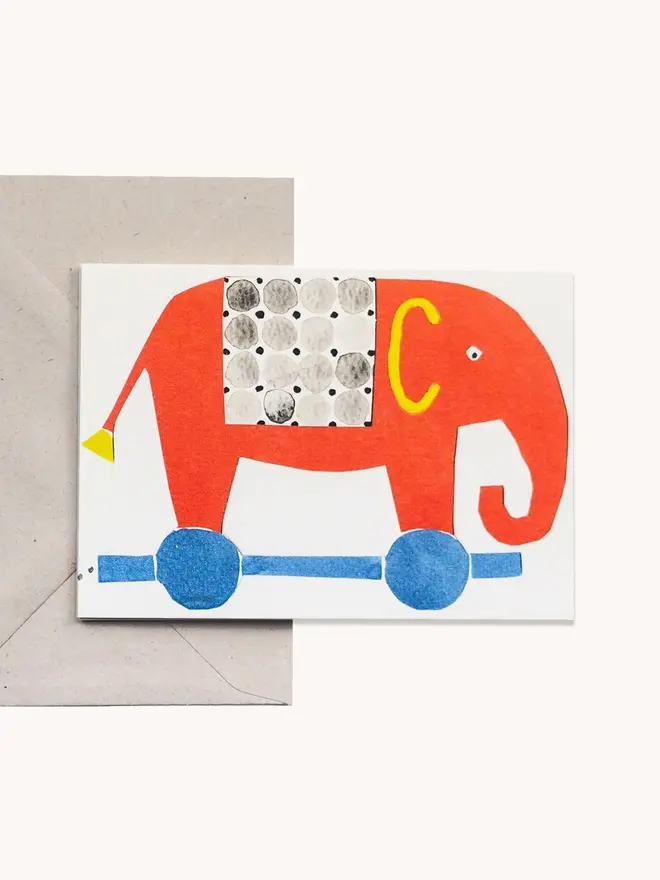 brightly coloured card with elephants