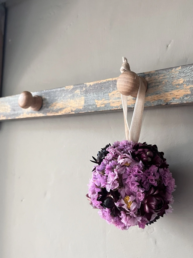 Berry Dried Flower Bauble made using a selection of pink and purple dried flowers