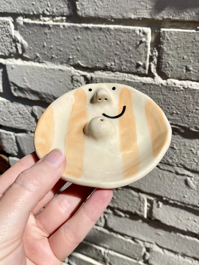 Orange incense dish