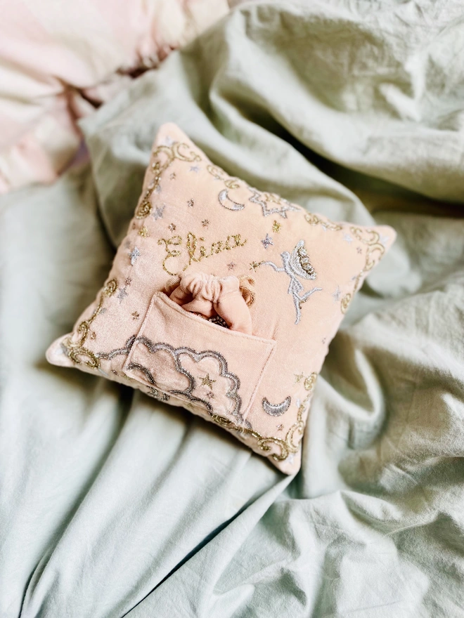 Too the fairy pillow pink velvet with sparkling gems and hand embroidered name in gold thread. Little pocket with drawstring bag for tooth. 