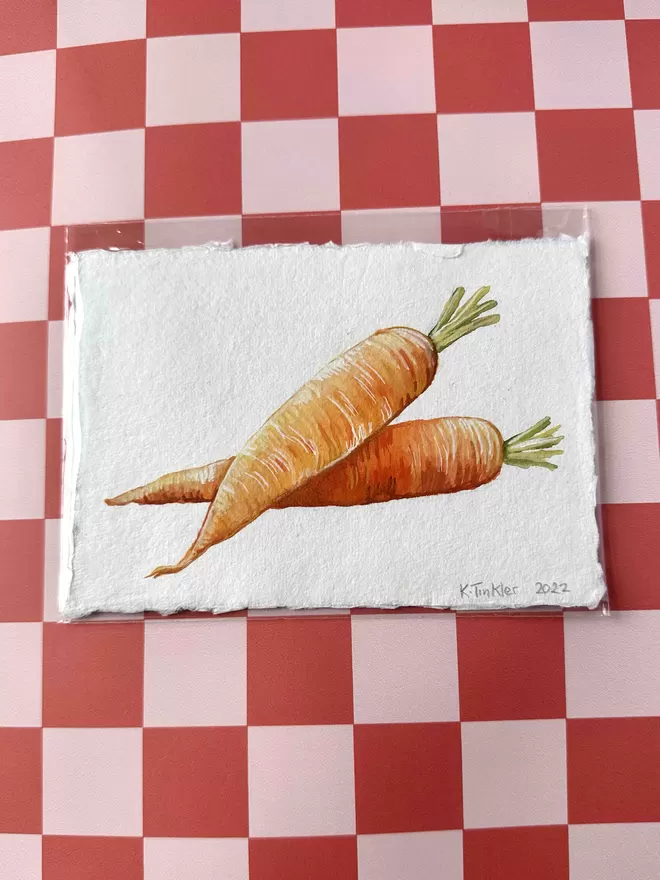 Katie Tinkler illustration gouache painting of carrots on a chequered background