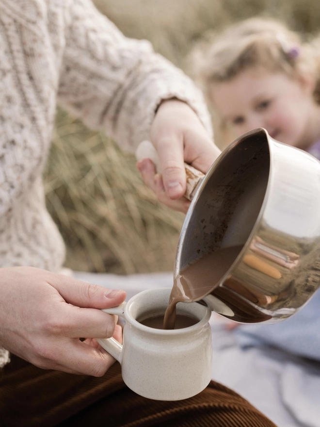 Making Harth hot chocolate on the beach 