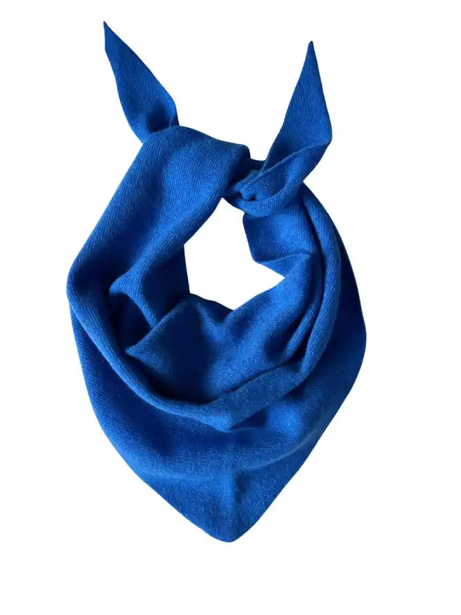 Cobalt blue triangle scarf shown from above on white background