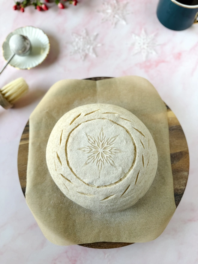 Stencilling on sourdough bread - before baking