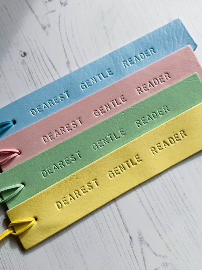 leather bookmarks stamped with 'dearest gentle reader'