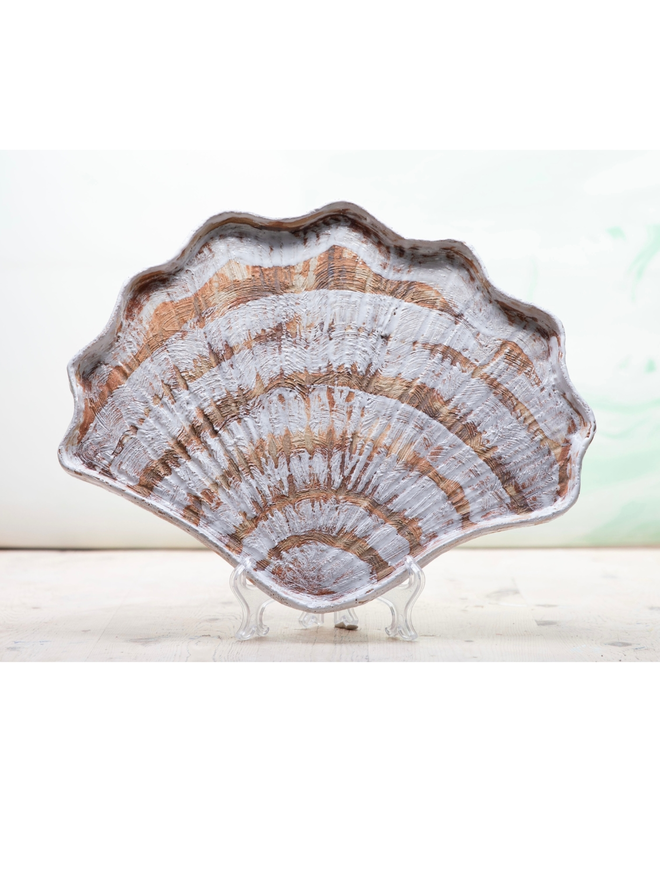 Ceramic shell plate