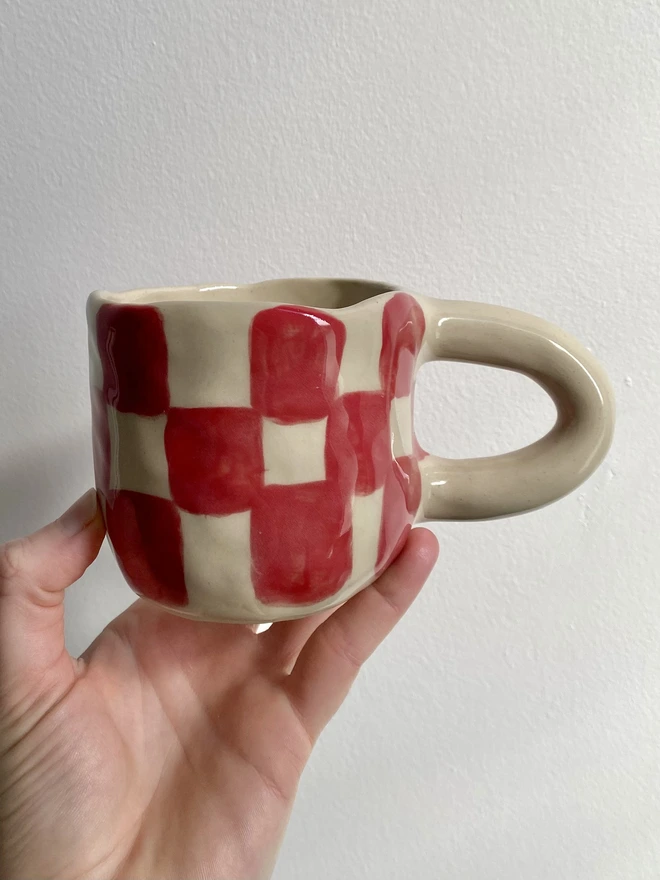 red checkerboard mug back