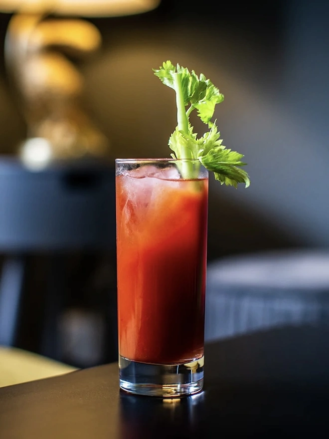 The Ultimate Bloody Mary In A Soup Can (Set Of 1, 2, 4), glass of bloody mary on a table. 