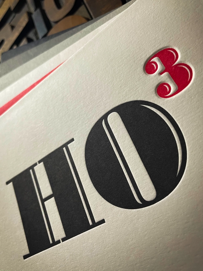 Ho Ho Ho! A beautiful typographic letterpress Christmas card. Printed in rich vibrant red and deep black inks with luxury matching and contrasting envelopes; ideal to send to your designer friends at the festive season.