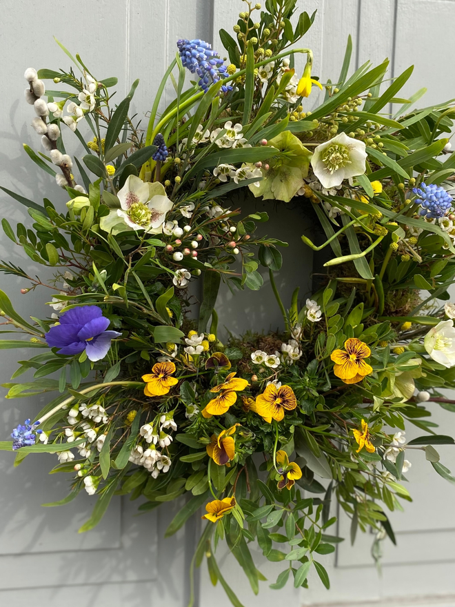 Fresh Spring Wreath with Bulbs Mimosa Viola Flowers