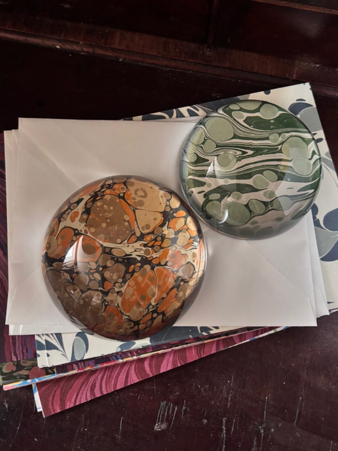 Large Paperweight. Two paperweights.