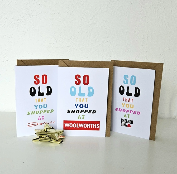 A photograph of 3 cards they say so old that you shopped at Woolworths Chelsea Girl and Dolcis