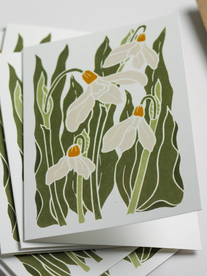 Snowdrops notecard set with recycled kraft envelopes. Eight A6 hand-carved botanical greeting cards and matching envelopes, eco-friendly stationery perfect for thank you notes and correspondence. British flora design