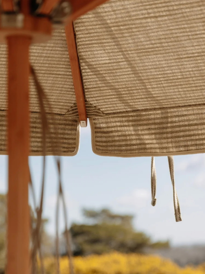 Ticking Stripe Parasol. A striped parasol.