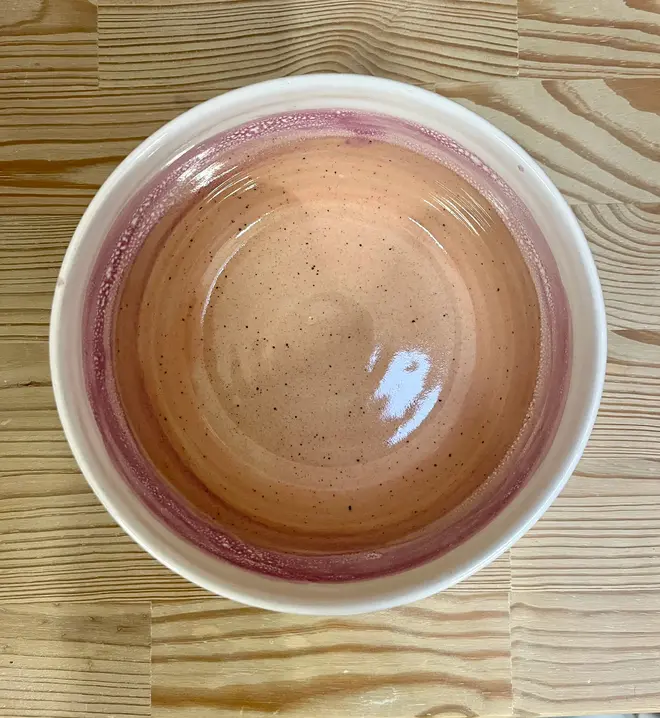 Ice Cream Sundae Ramen Bowl, a colourful ramen bowl sitting on a wooden surface. 