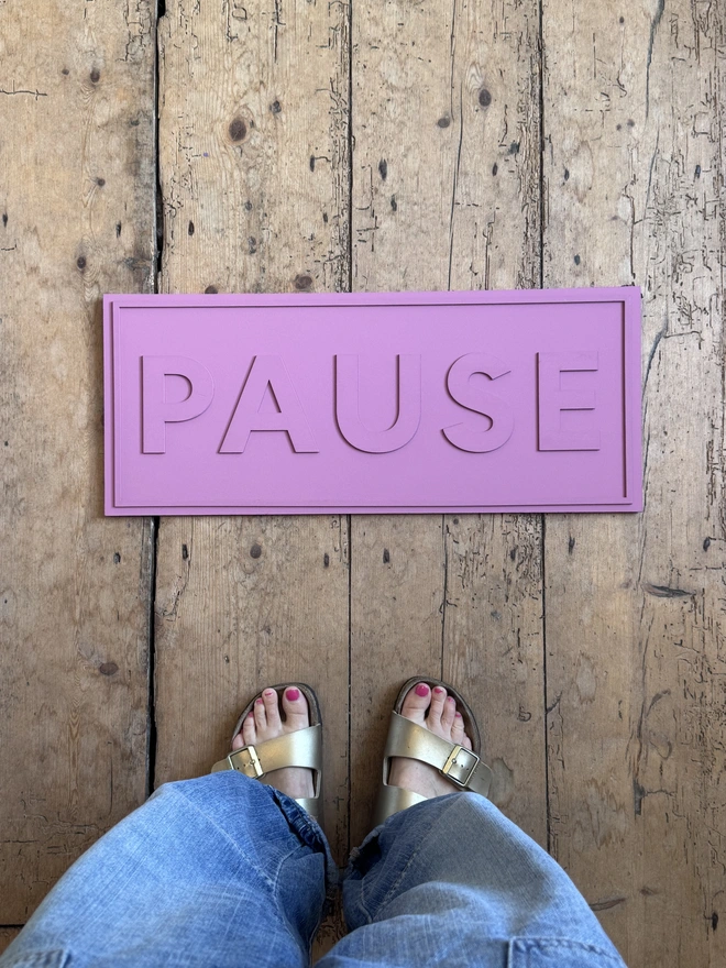 pink colour drench pause sign 