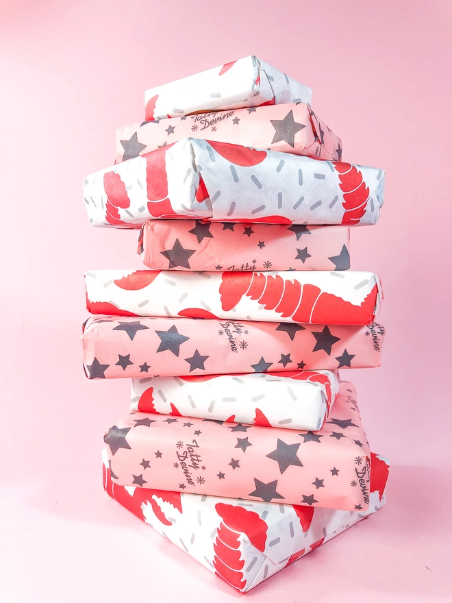 Tatty Devine Gift Wrapped Boxes in lobster and star print.