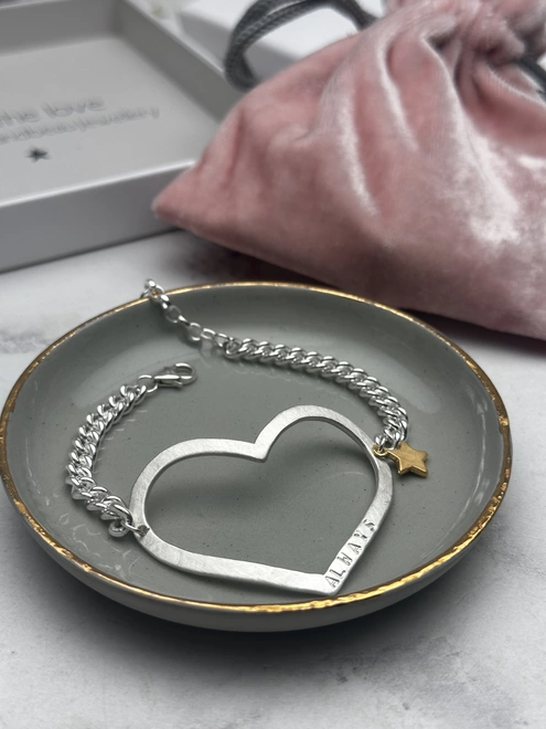 personalised large open heart charm in silver on chunky curb chain with a small gold star charm. 