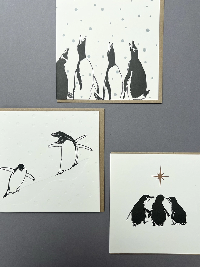 Three of the Christmas penguin collection