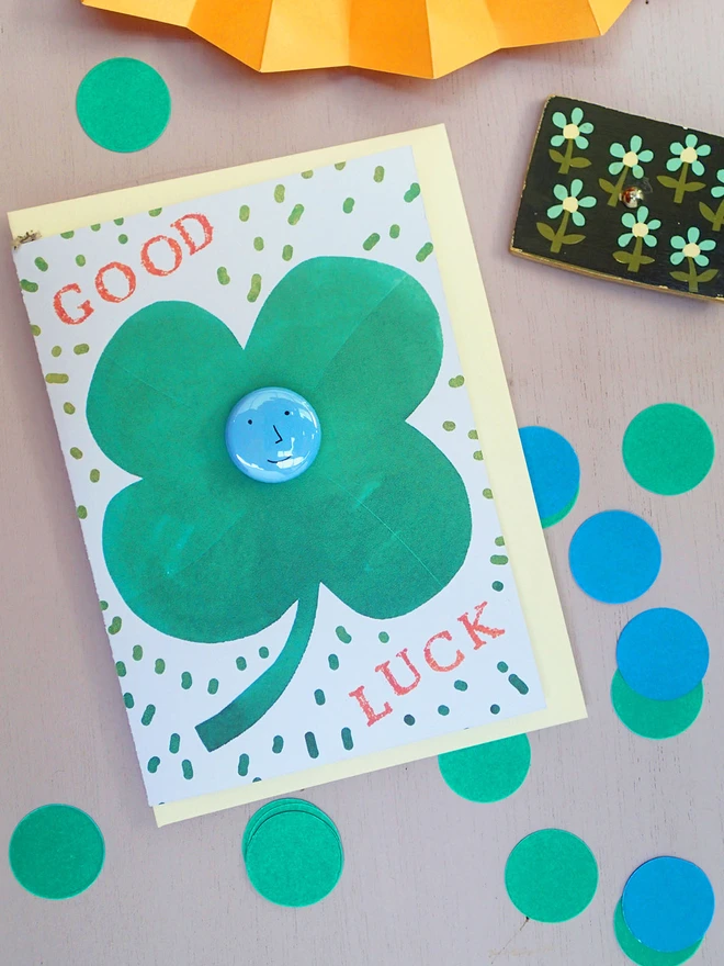 lucky clover good luck card with face pin badge