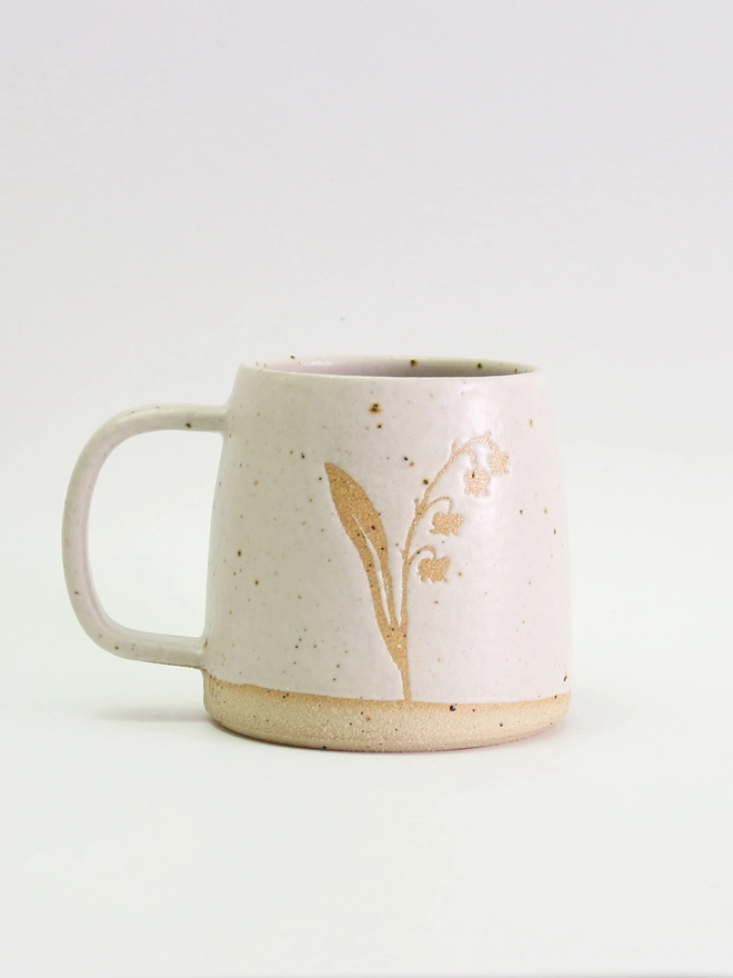 Close up of lily of the valley mug details