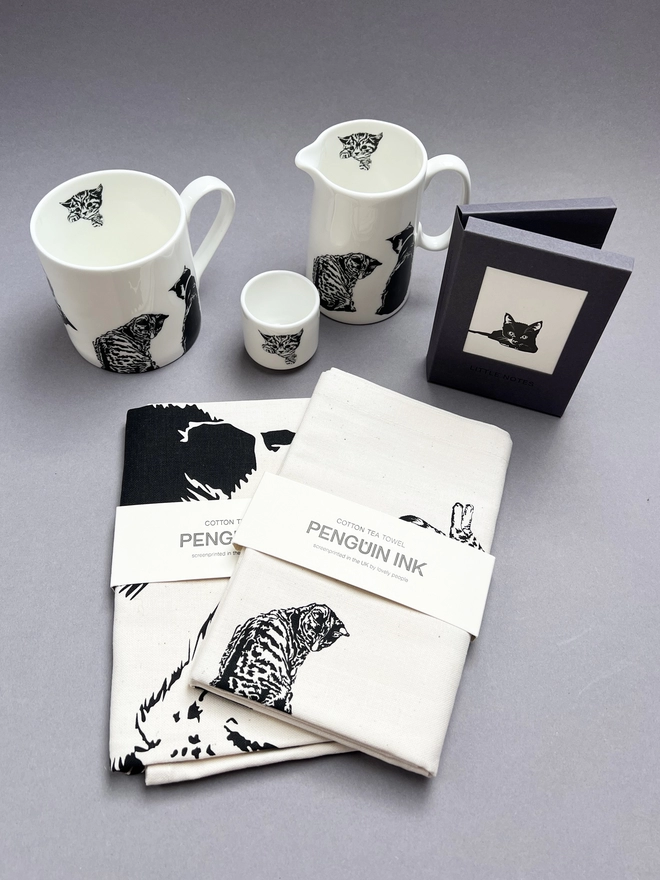 Collection of cat homewares, tea towels , mugs and jugs