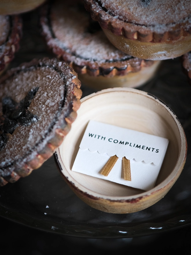 handpainted wooden mince pie with a secret message