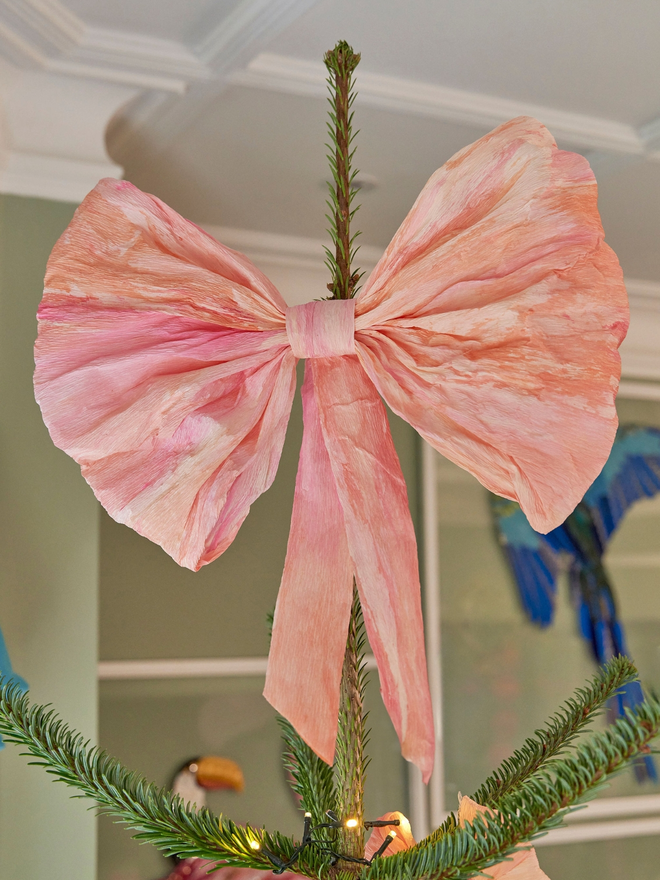 Crepe paper bow Christmas tree topper