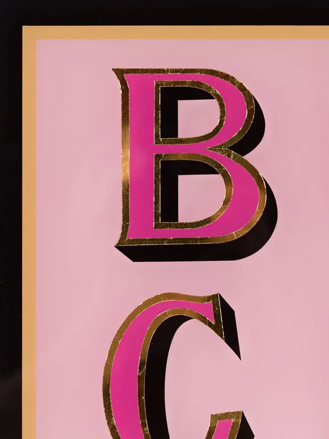 boys club pink hand painted sign. image zoomed in on sign lettering.