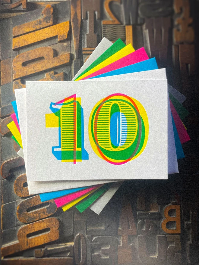 10th birthday anniversary typographic letterpress card. Deep impression print. Unique with no print being the same. They show slight colour variations adding to the style. Also available in other milestones : 1, 2, 3, 18, 21, 30, 40, 50, 60, 70, 80.