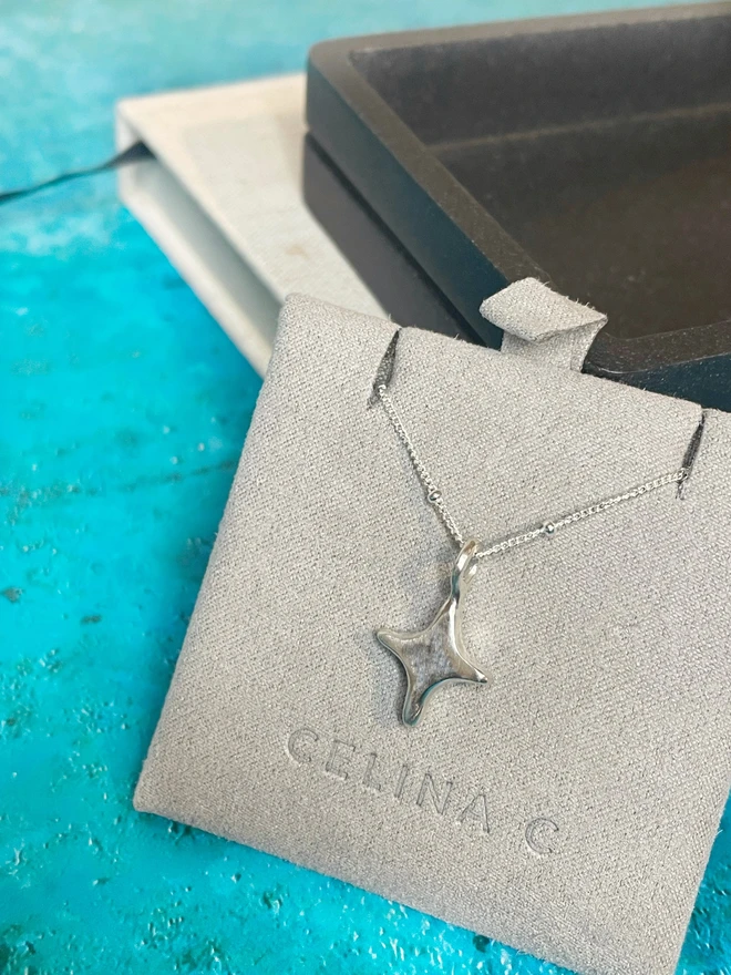 Hand made star charms made from 100% recycled sterling silver, cute gift for girlfriend or wife for Valentine's Day or Mother's Day. Add a personalised initial and send straight to your special someone. Made by Celina C Jewellery, a small business in the UK, find on Holly and Co.