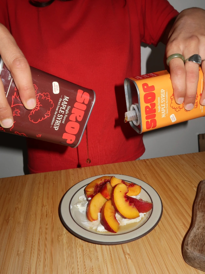 Maple Syrup Duo. Two cans of maple syrup from Sirop being used.