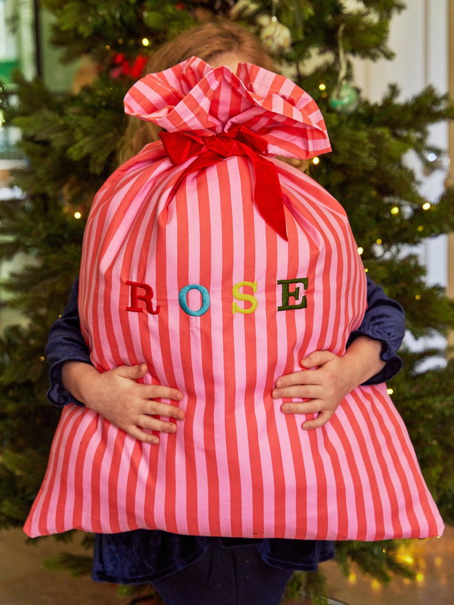 Personalised bright striped Christmas sacks