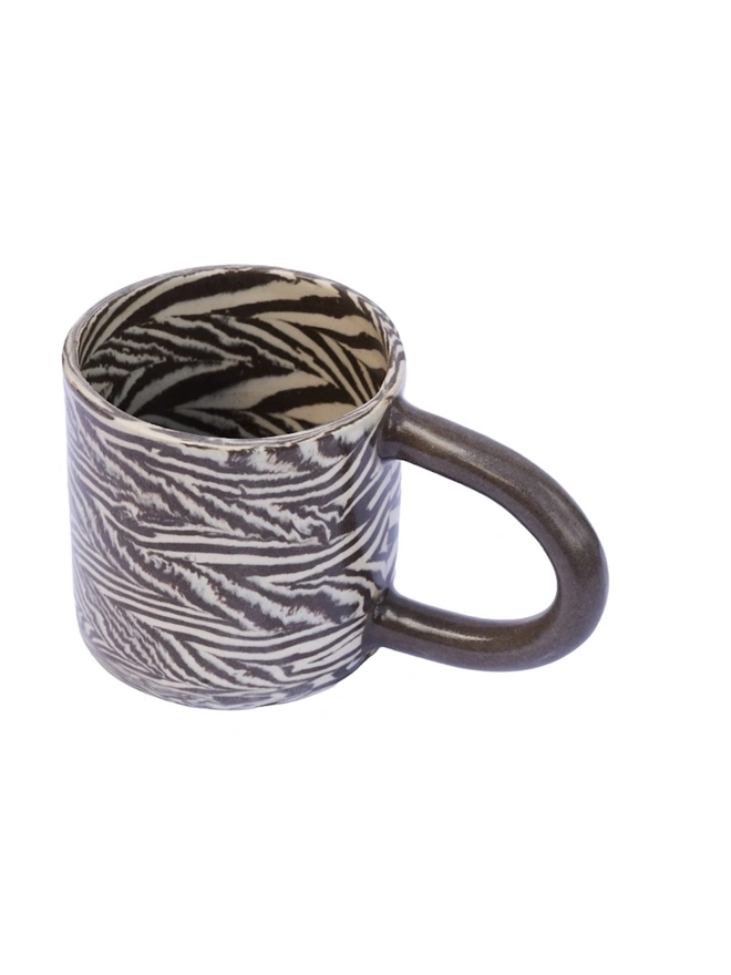 Herringbone Chunky Mug, a colourful mug sitting on a white surface against a plain backdrop. 