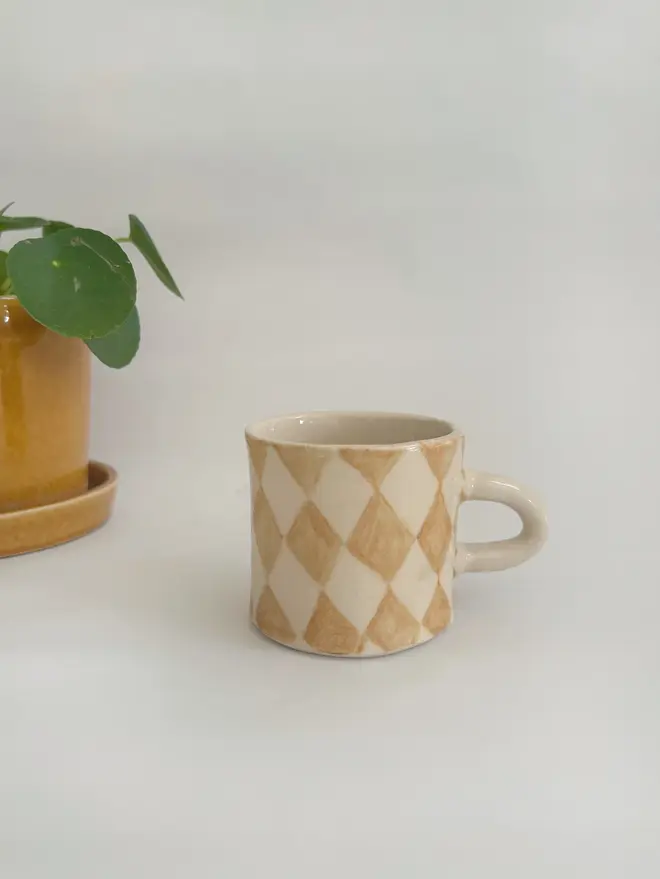 harlequin pattern ceramic mug