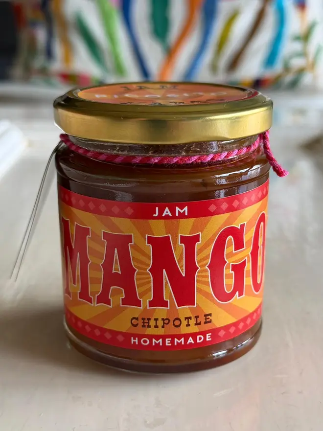 'Mango' Jam Jar (Set Of 1-4 Jars), a jam jar sitting on a kitchen counter. 