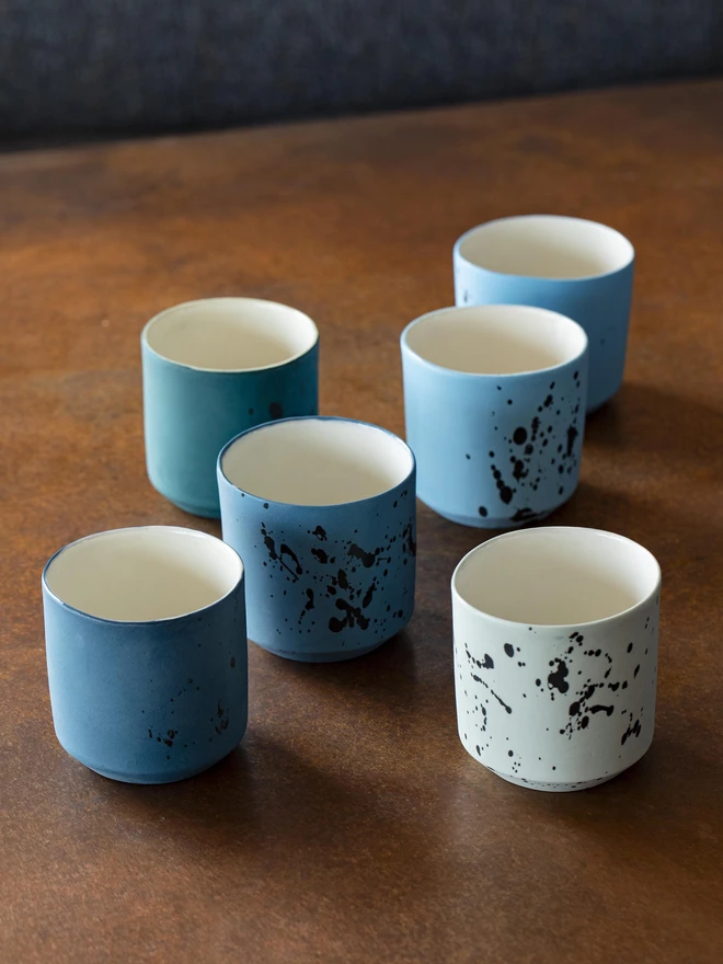 Mixed grouping of different coloured tumblers
