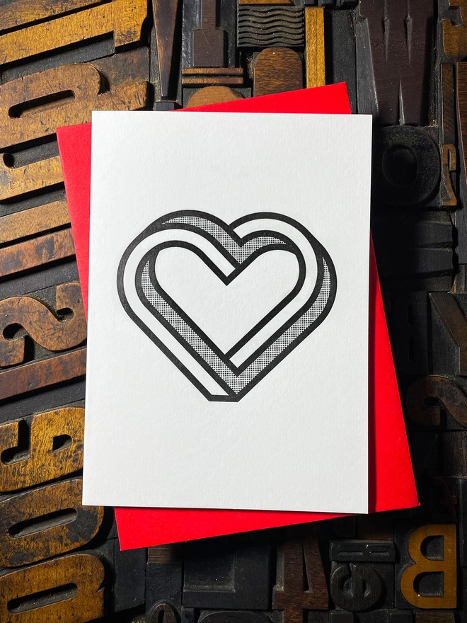 MONO INFINITY HEART LETTERPRESS CARD. Printed on my 1915 Arab Crown Folio Press. Black ink using a deep impression print. Printed on the finest Colorplan Pristine White thick double-sided card with a range of matching colours self-seal envelope.